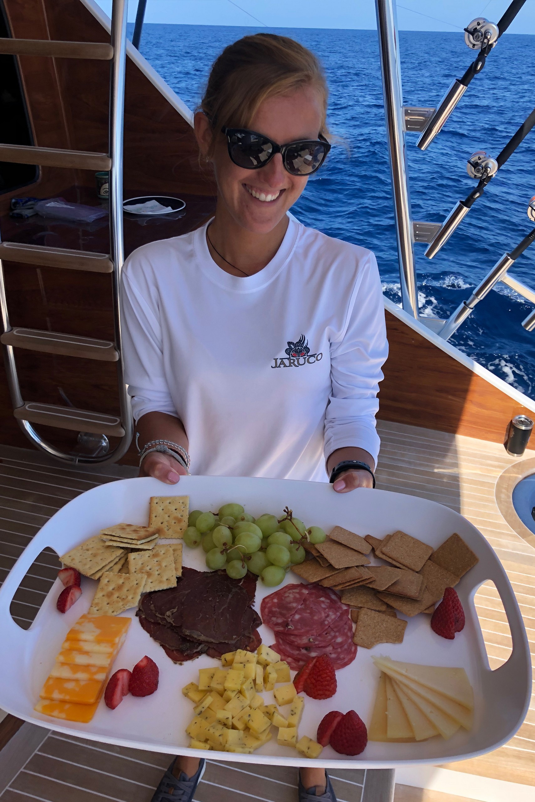 Jaruco stewardess Lotte with a platter of fruit