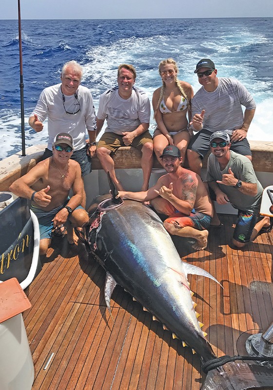 fishing team with large tuna