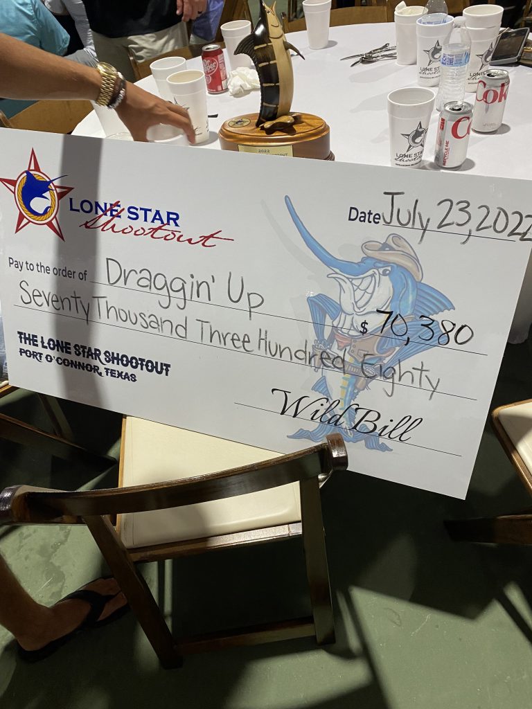 The check for Draggin' Up's prize money, $70,380.